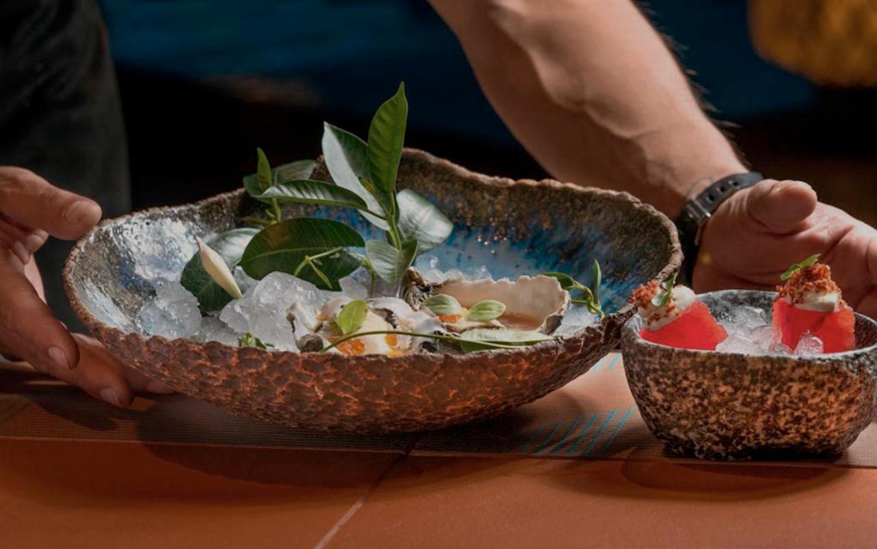 Aguas de Ibiza Grand Luxe Hotel Santa Eulalia del Río Exterior foto A dish of abalones