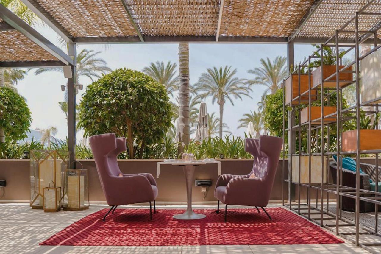 Aguas de Ibiza Grand Luxe Hotel Santa Eulalia del Río Exterior foto The rooftop terrace at the hotel